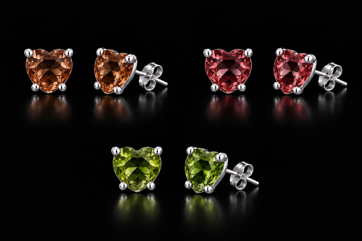 The VooDooStone heart-cut stud earrings grouped to compare the daylight, incandescent and fluorescent colors. Item 894788.