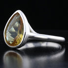 Sterling Silver Bezel VooDooStone Pear Shape Ring - David's Antiques & Jewelry