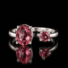VooDooStone open gap ring in .925 sterling silver, oval and round stones showing purplish-pink daylight colour, front view