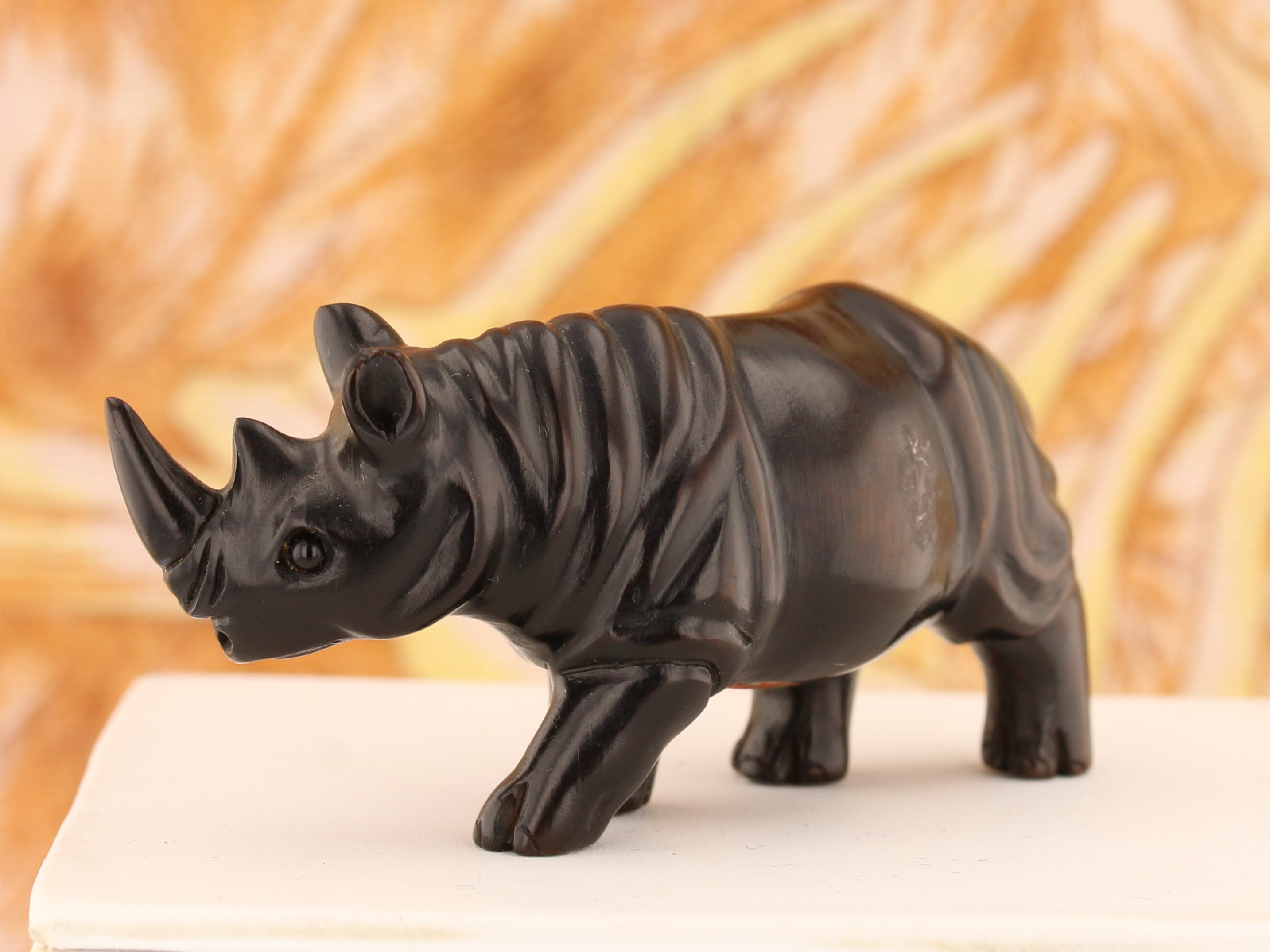 Regal Rhinoceros Dark Wood Netsuke - David's Antiques & Jewelry