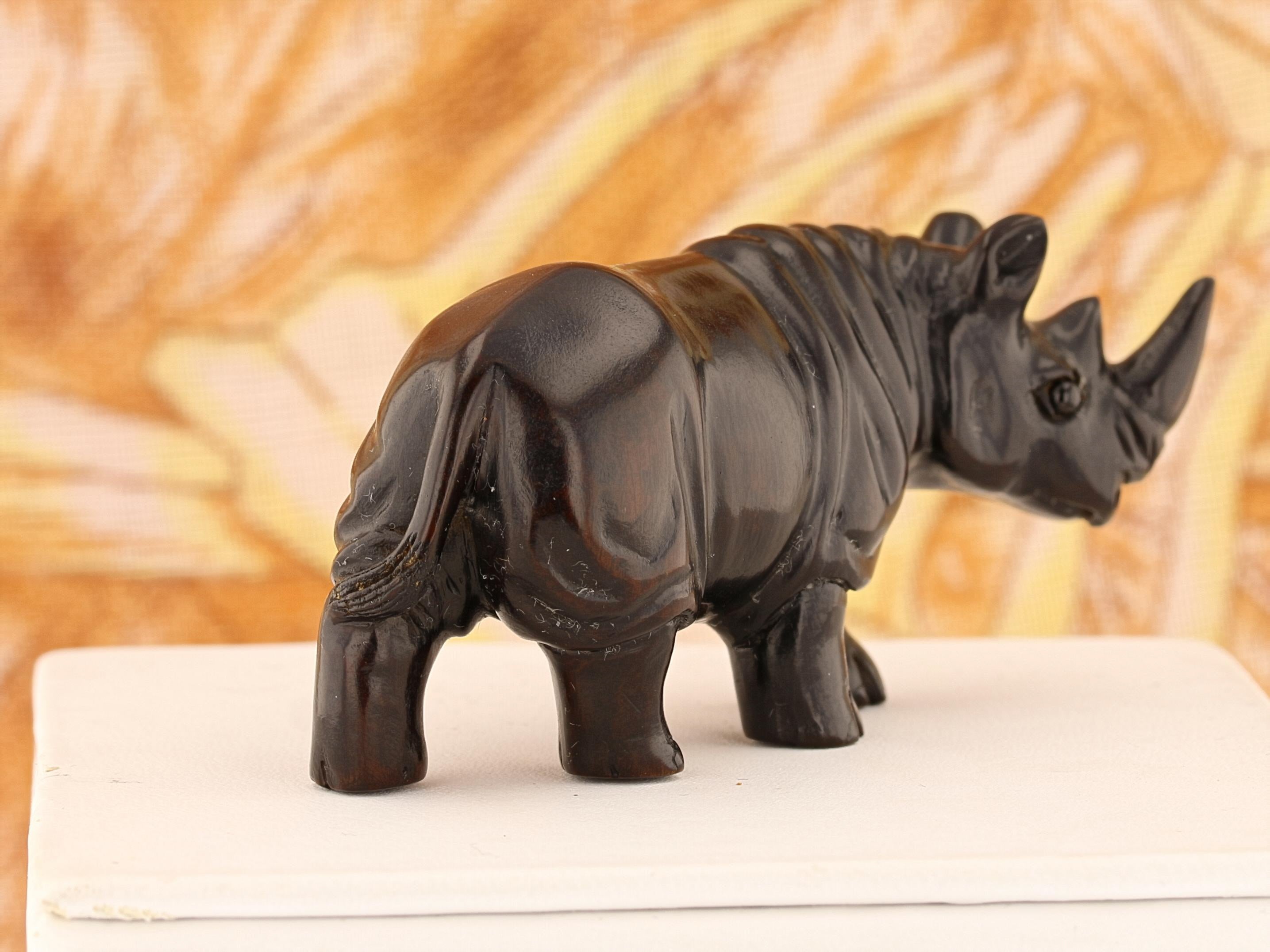 Regal Rhinoceros Dark Wood Netsuke - David's Antiques & Jewelry